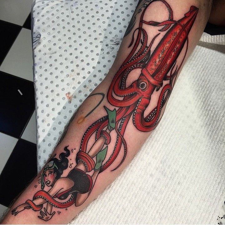 Angry red squid and a diver