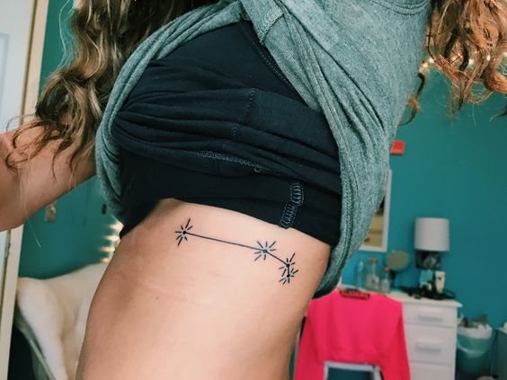 Aries constellation left rib cage tattoo