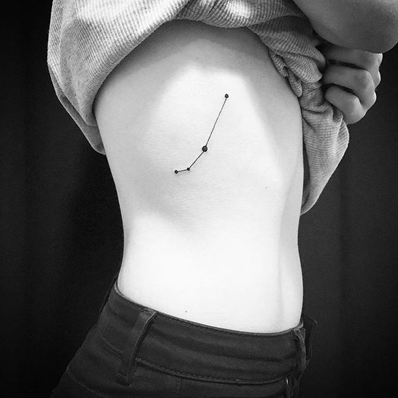 Aries constellation tattoo on the right rib cage