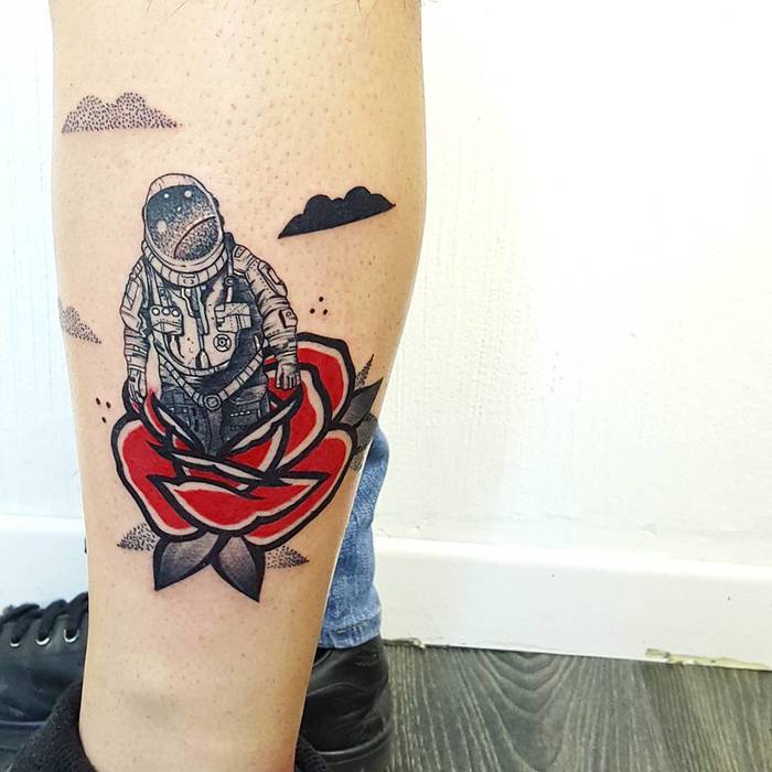 Astronaut coming from the rose tattoo