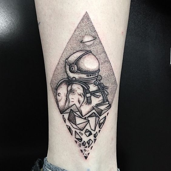 Astronaut rhombus tattoo