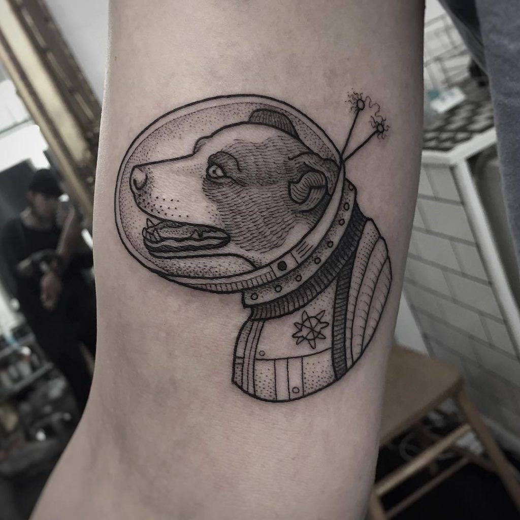 Beautiful dog astronaut tattoo by susanne konig
