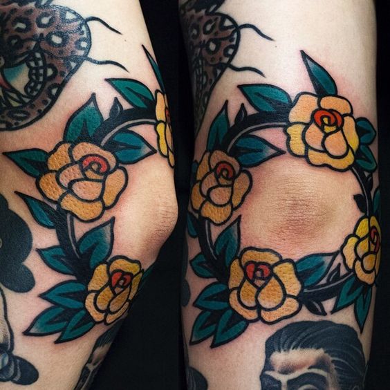 Beautiful matching floral wreath knee tattoos