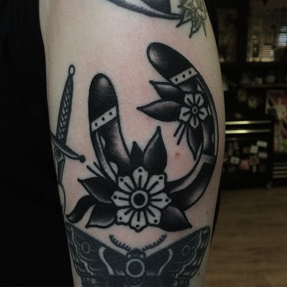 Black and grey horseshoe with flowers