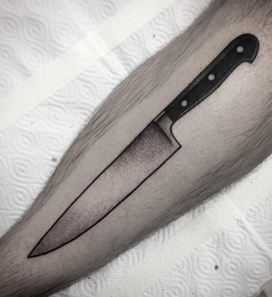 Black chef knife tattoo