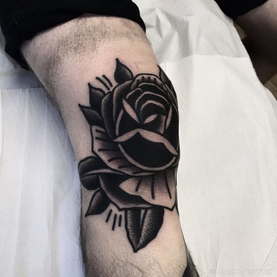 Black rose on the knee by adam hudson