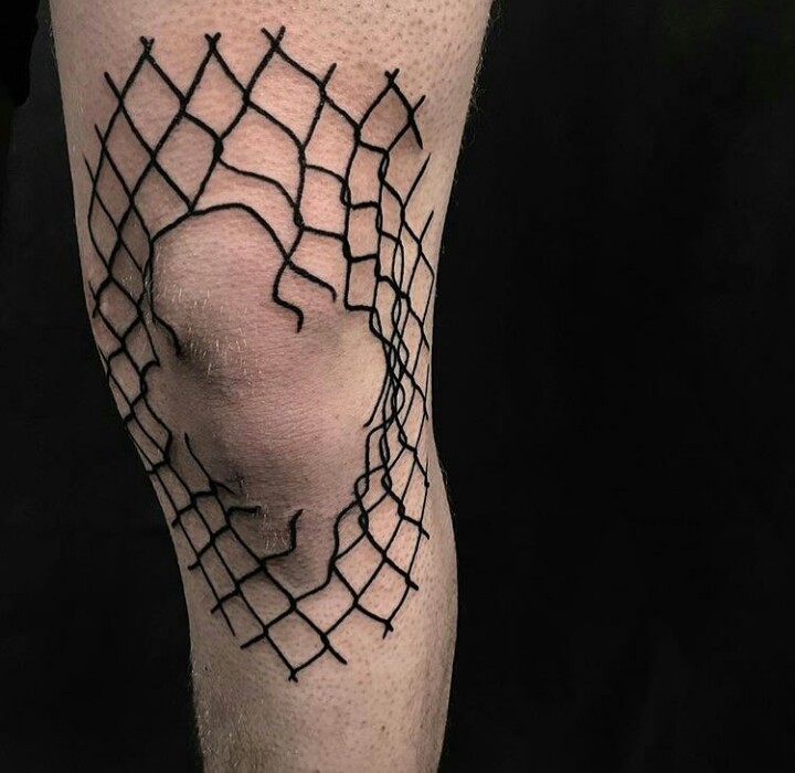 Broken fence knee tattoo
