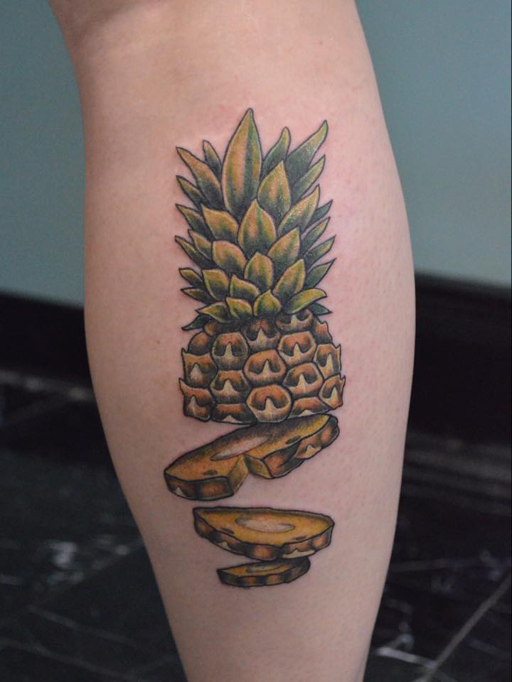 Chopped pineapple on the right calf