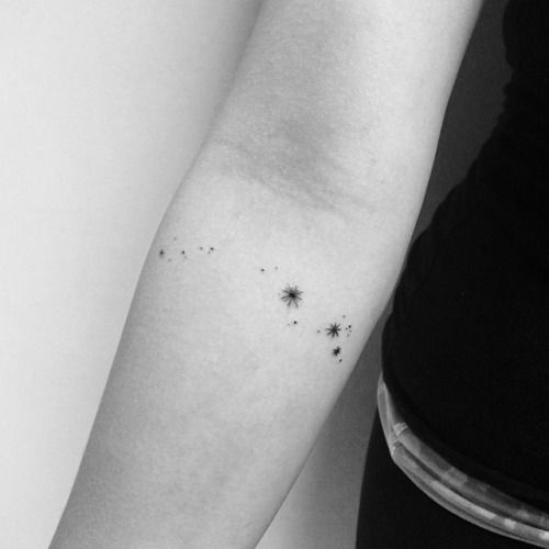 Dot work style aries constellation tattoo on the inner arm