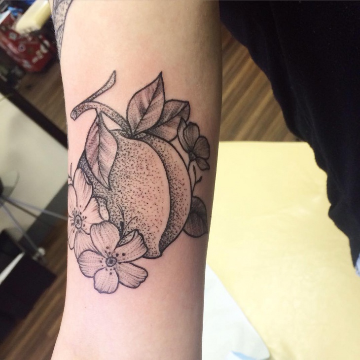 Dotwork black and grey peach tattoo