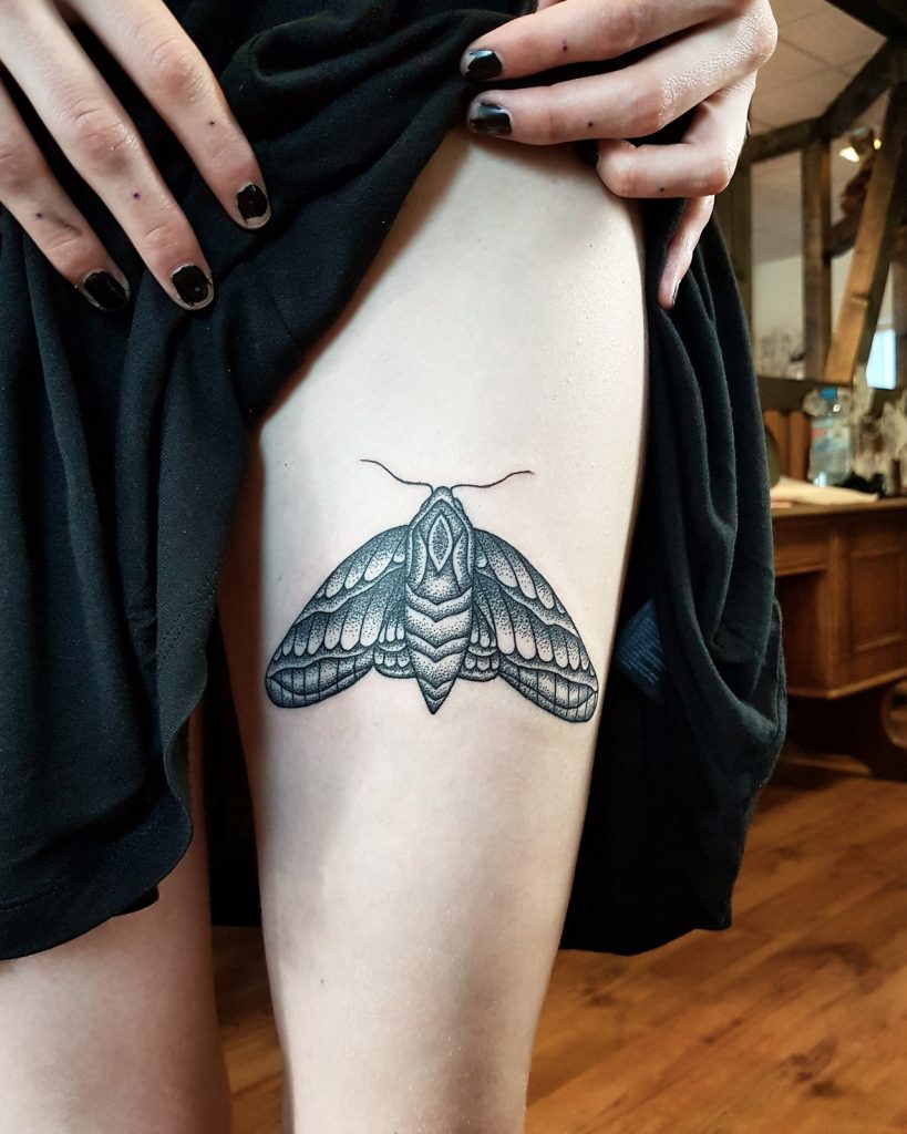 Fantastic dotwork style moth on the thigh