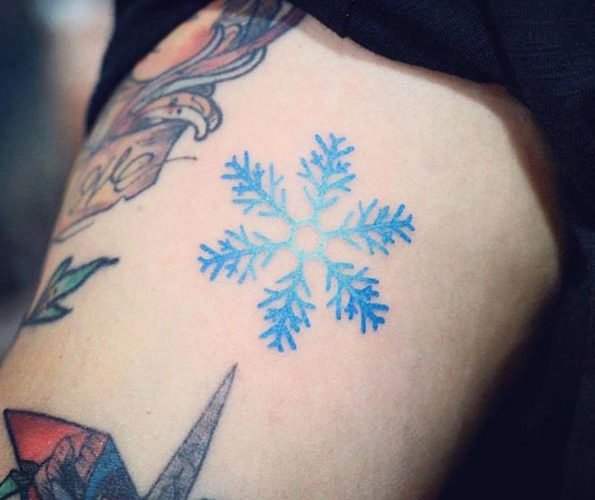 Gradient blue snowflake tattoo