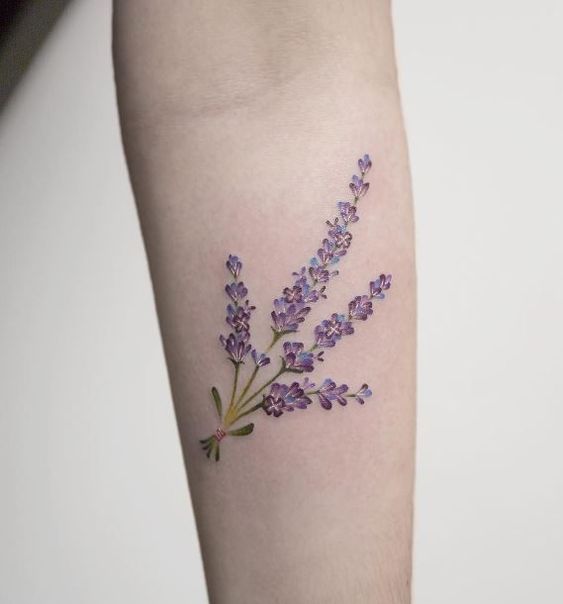 Hyper realistic lavender tattoo on the left forearm