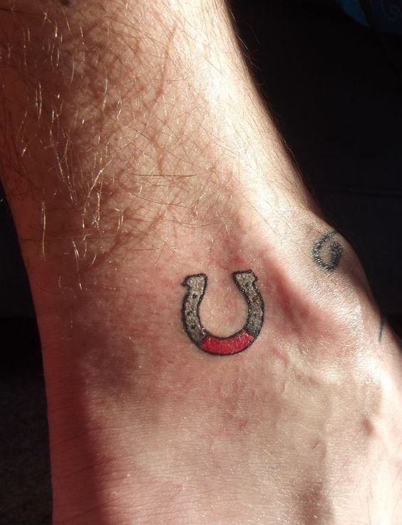 Incredibly small and cute horseshoe on the left inner ankle