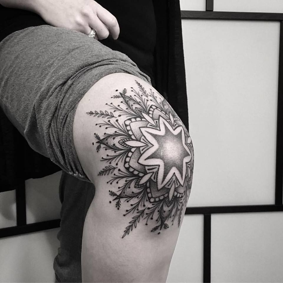 Inspiring star mandala knee tattoo