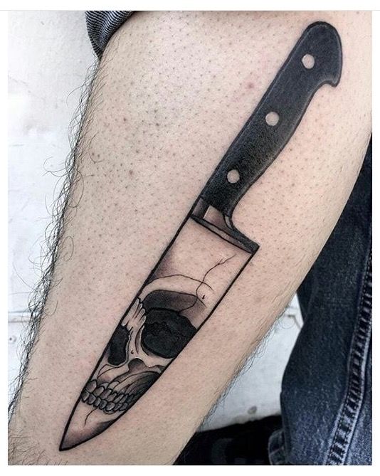 Knife with a skull on the blade
