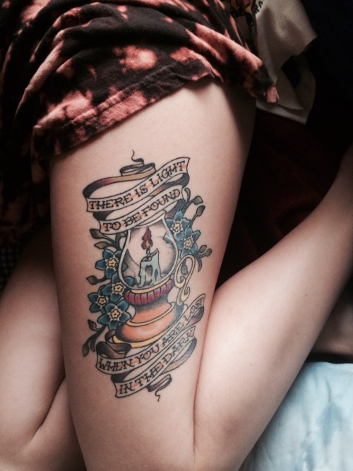 Lantern with a candle tattoo on the thigh