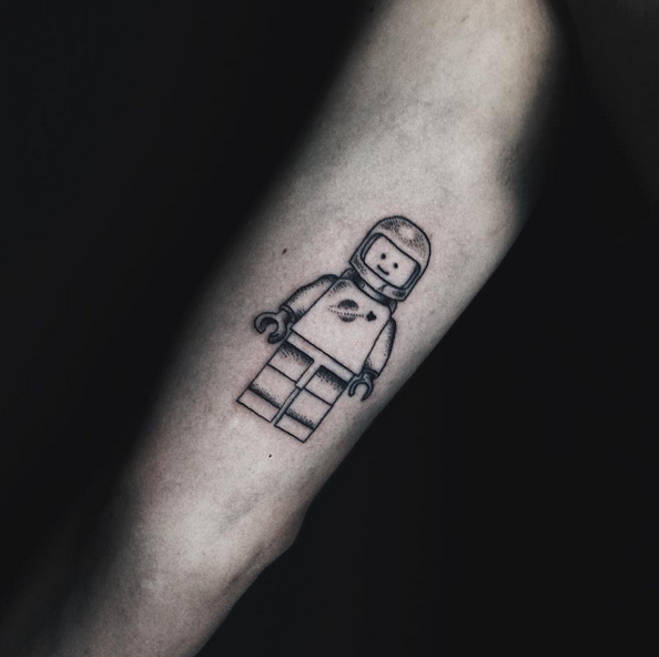 Lego astronaut tattoo by carolin walch