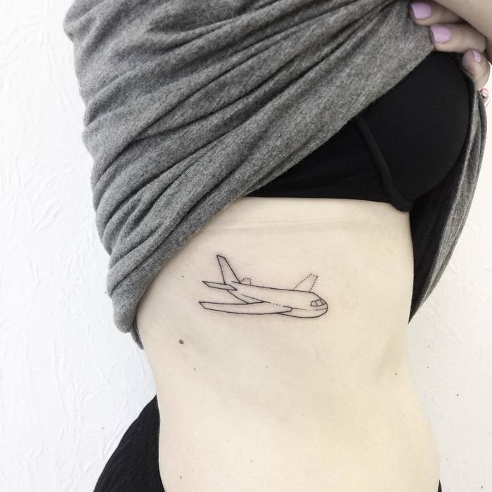Linear jet airliner on the right rib cage