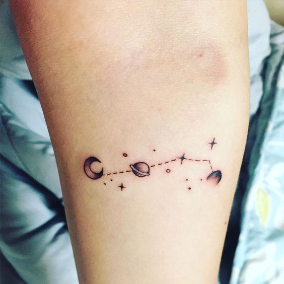 Little aries constellation tattoo with moon and saturn