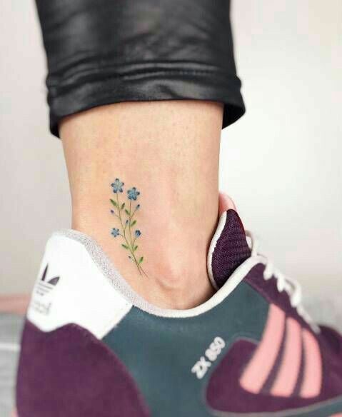 Little forget me not tattoo on the right ankle