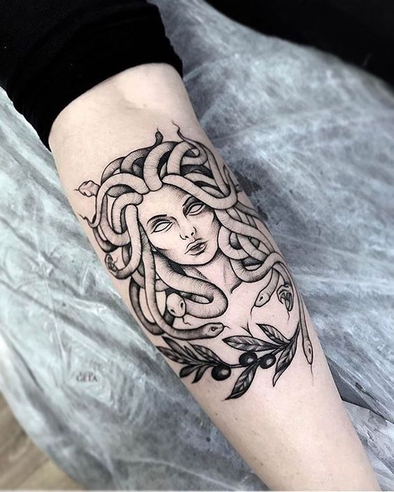 Medusa tattoo with olive branch