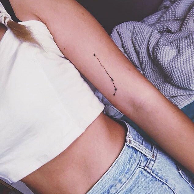 Minimal aries constellation tattoo on the left arm