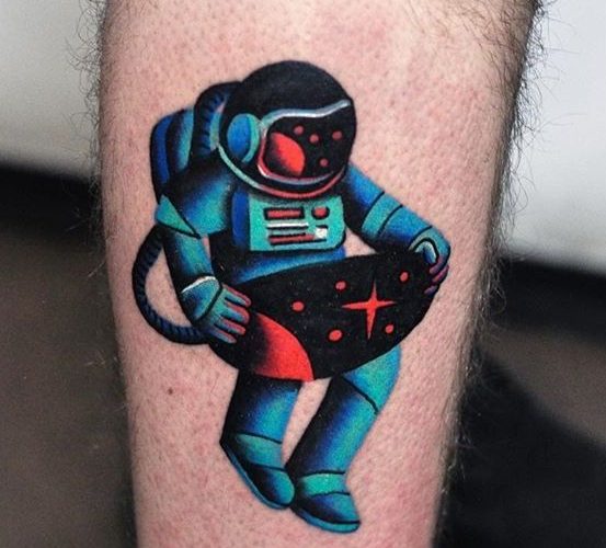 Modern tattoo of an astronaut by david cote