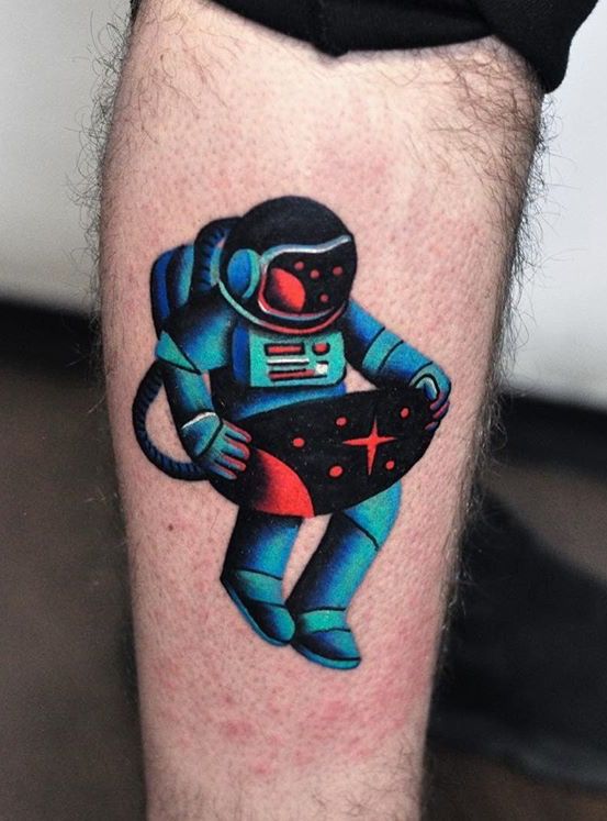 Modern tattoo of an astronaut by david cote