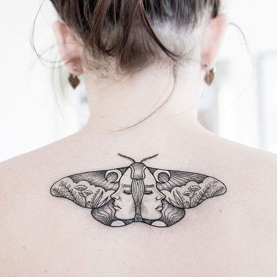 Moth with the woman face on the wings