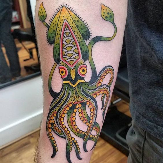 Neo traditional green squid on the forearm