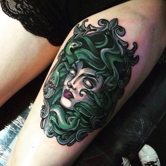 Neo traditional style medusa tattoo on the upper thigh by olivia granger