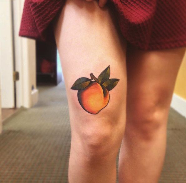 Peach tattoo on the leg