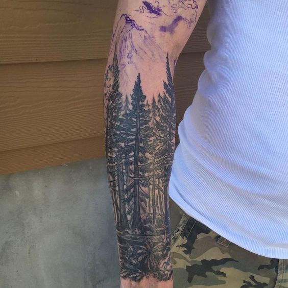 Realistic woods tattoo on the forearm
