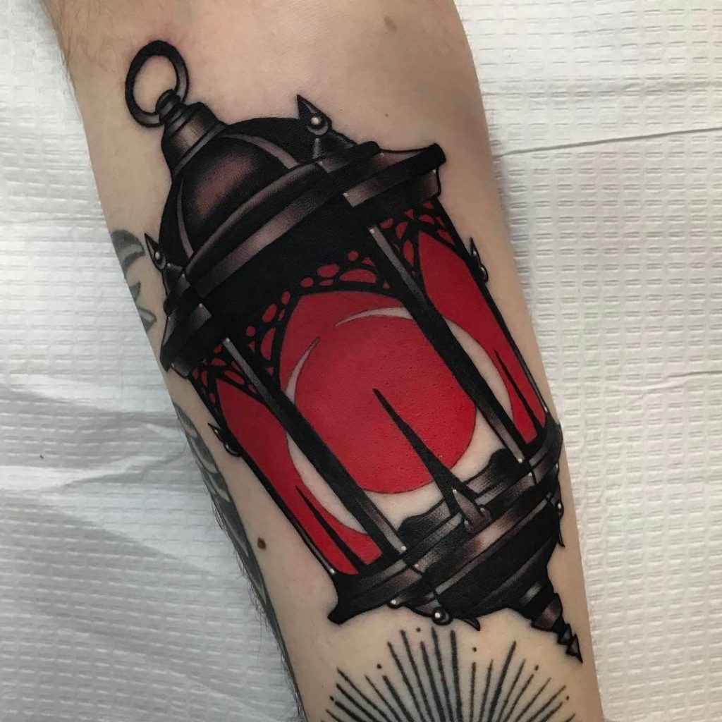 Red lantern with a crescent moon tattoo