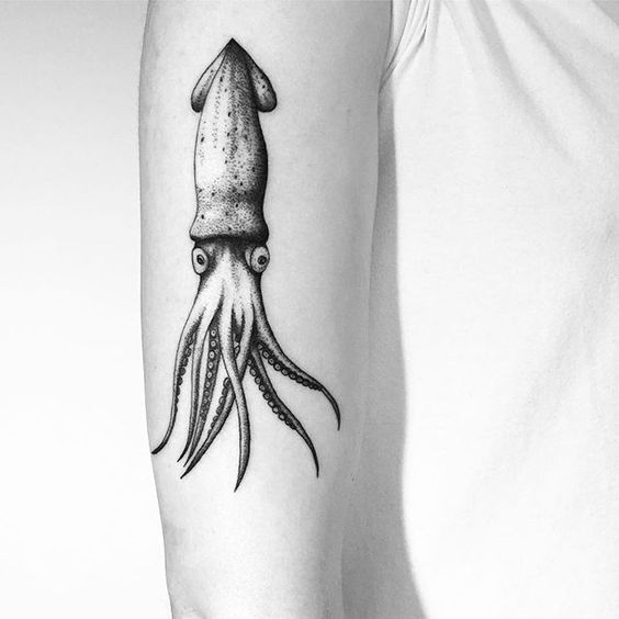 Simple dotwork squid tattoo