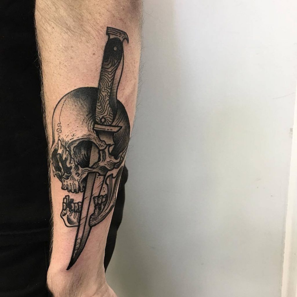 Skull pierced with a knife by scott move