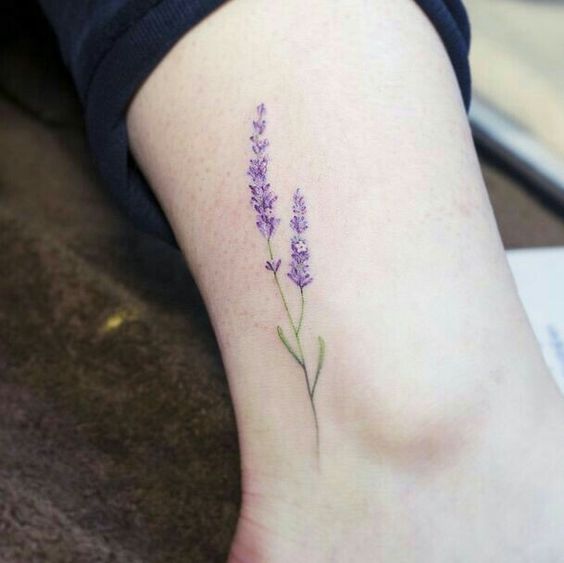 Small and delicate lavender tattoo on the ankle