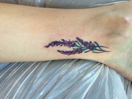 Small lavender wrist tattoo