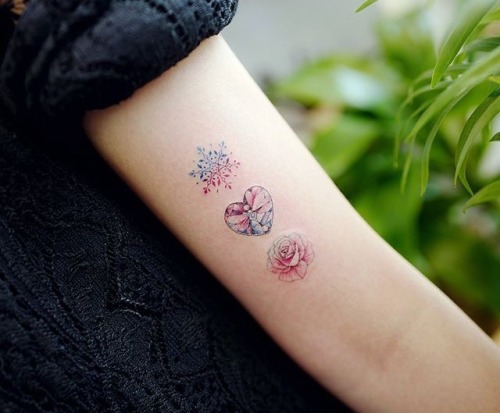 Snowflake heart and rose tattoo