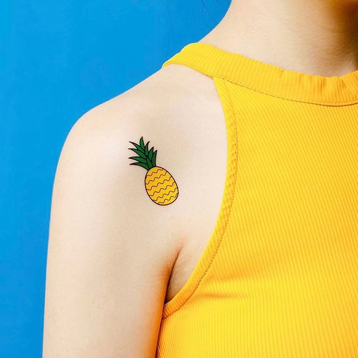 Temporary pineapple on the right shoulder