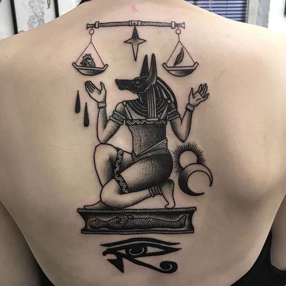 This excellent blackwork tattoo on the back