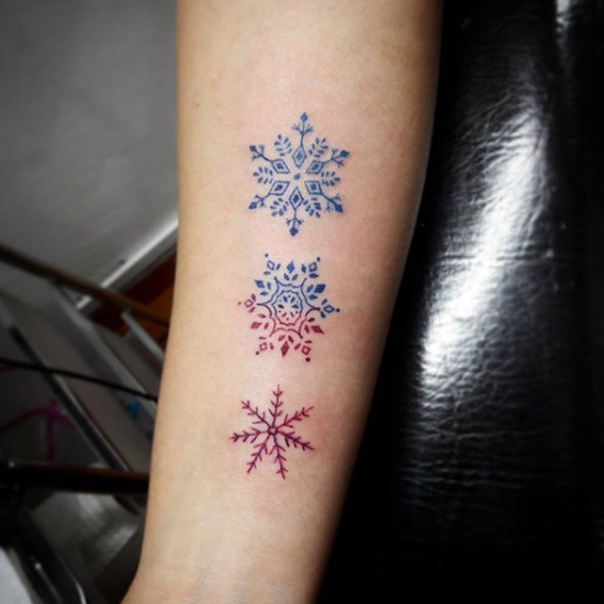 Three blue and red snowflakes