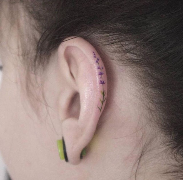 Tiny lavender ear tattoo