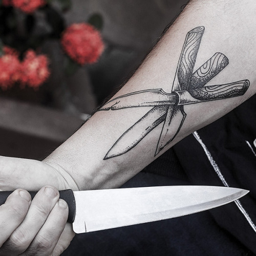 Tripple black knives tattoo
