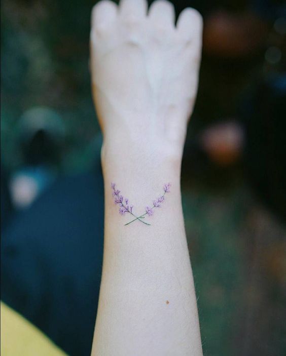 Two crossed lavenders on the right outer wrist