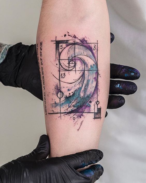 Watercolor fibonacci spiral tattoo