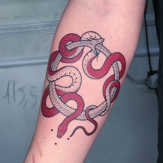 White and red ouroboros snake tattoo