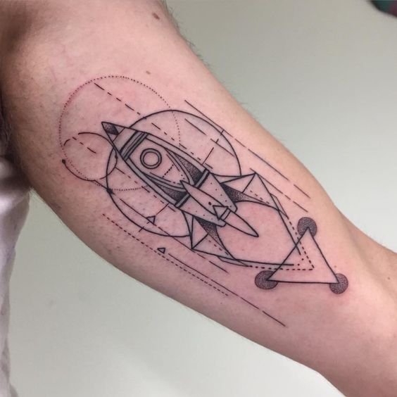 Abstract linear spaceship on the left bicep
