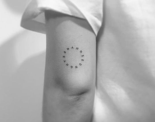 Circled letters tattoo